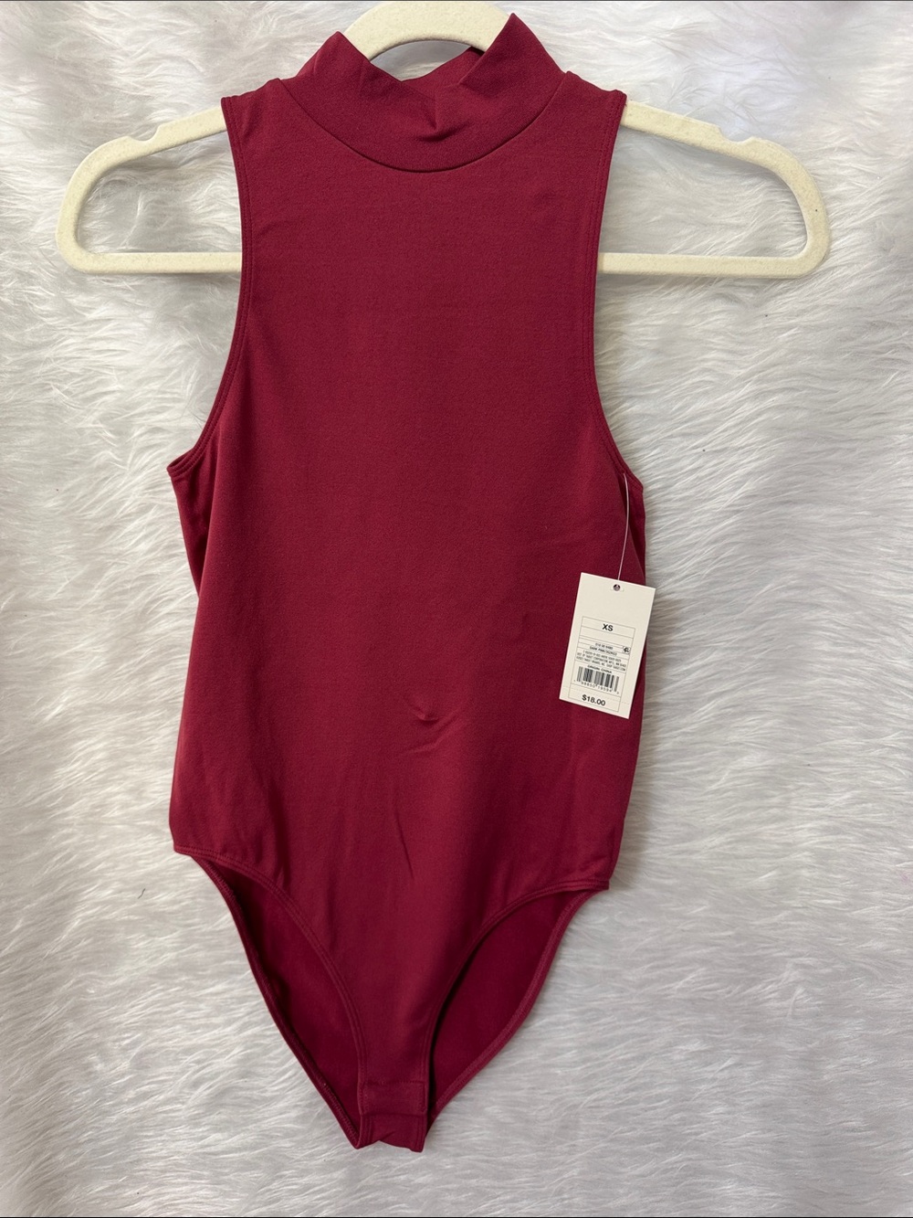 Sleeveless Mock Neck One-Piece Bodysuit in Deep Burgundy